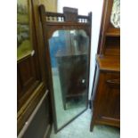 An Edwardian walnut rectangular mirror A/F