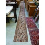 Two floral decorated runners CONDITION REPORT: Lengths: 268cm x 57 cm & 640cm x 57