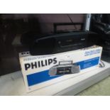 A boxed Phillips dual deck stereo radio cassette recorder