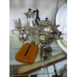 A collection of plated ware to include hot water jug, teapot, cream jug, flatware etc.