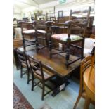A reproduction refectory style oak dinning table with a set of four standard,