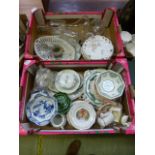 Two trays of ceramic and glassware to include decanters, plates, bowls etc.