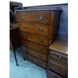 An early 20th century oak chest of six drawers