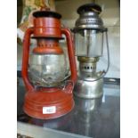 Two paraffin lamps,