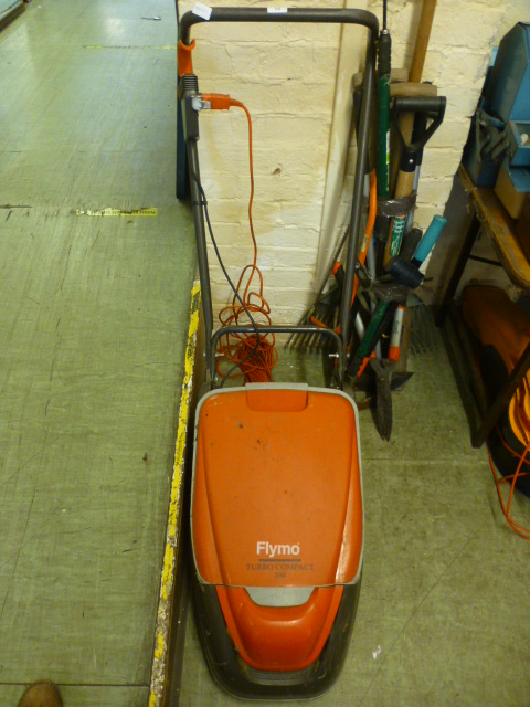 A Flymo turbo compact 350 electric lawn mower