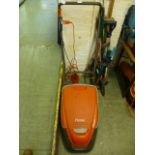 A Flymo turbo compact 350 electric lawn mower