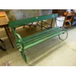 A wrought metal and green painted garden bench A/F