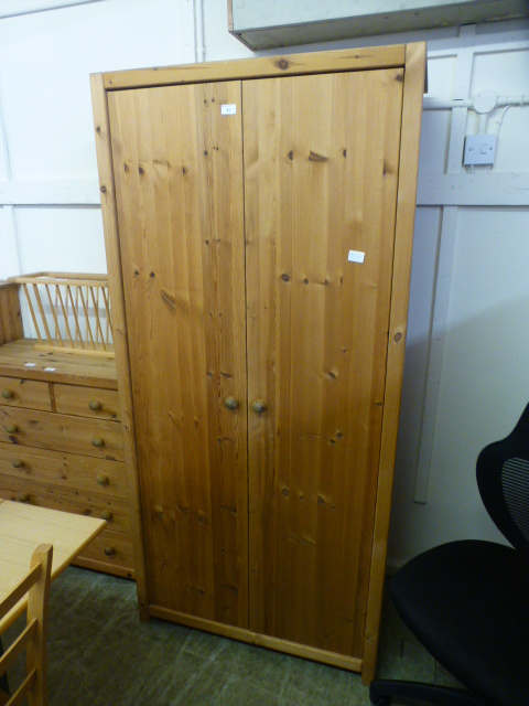 A pine two door wardrobe