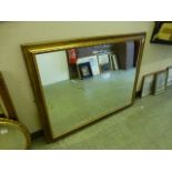 A gilt framed bevel glass rectangular mirror