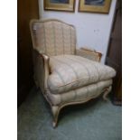 A French style cream salon chair with caned sides on cabriole legs CONDITION REPORT: