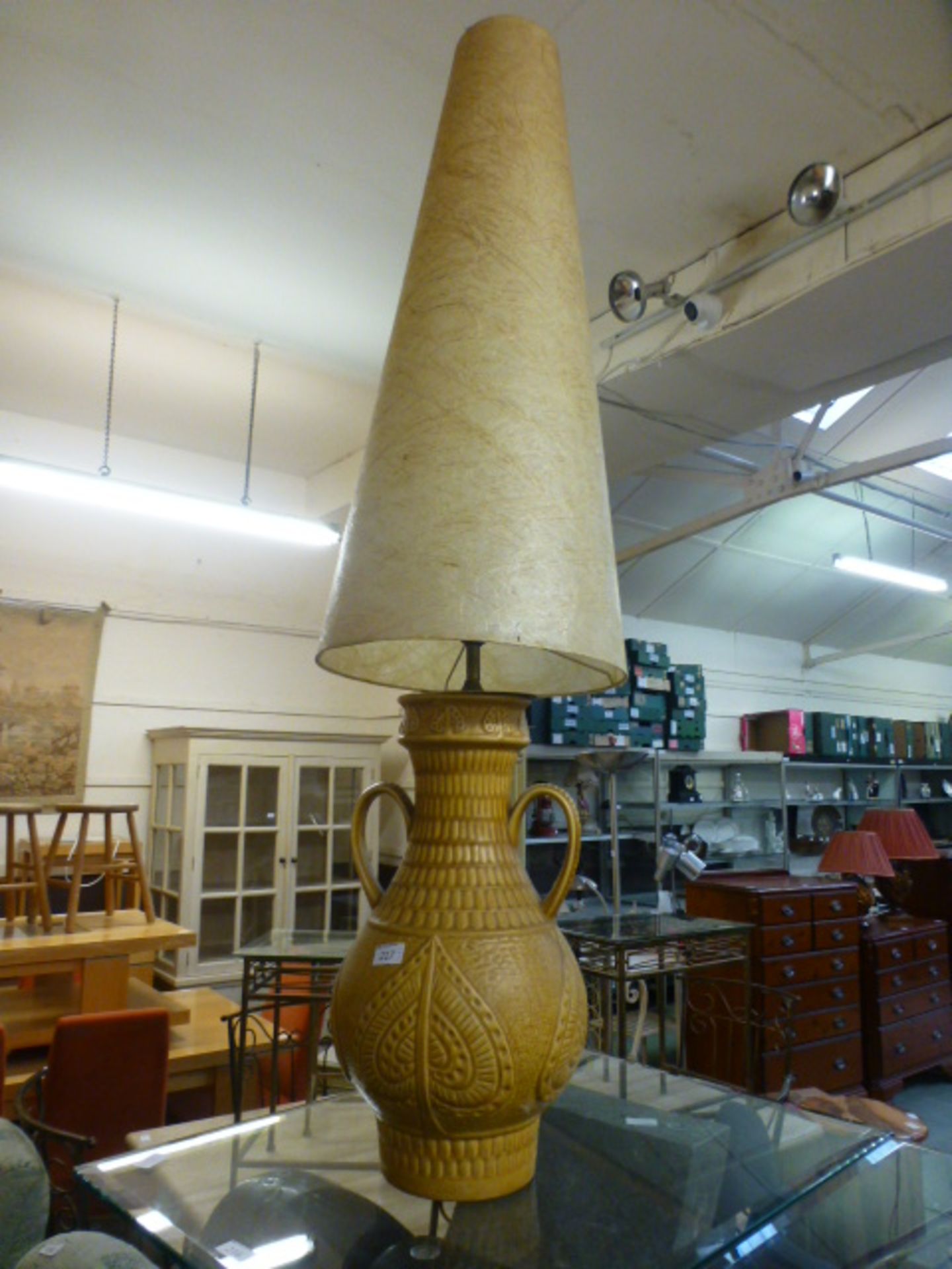 A mid-20th century design ceramic table lamp with a tall fluted shade