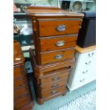 A pair of Ducal pine bedside chests of three drawers CONDITION REPORT: Some minor