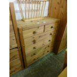 A pine chest of two short over four long drawers