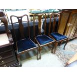 Three early 20th century Queen Anne style dining chairs with cabriole supports