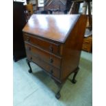 An early 20th century mahogany bureau,