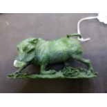 A green carved stone model of a boar signed Gonde