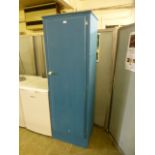 A blue single door cupboard