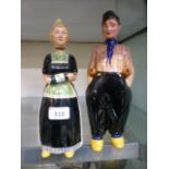 A pair of Dutch ceramic figural decanters