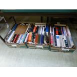 Three trays of hardback books on various subjects