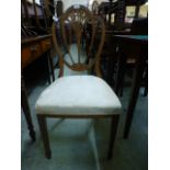 An Edwardian walnut and ebony strung single chair