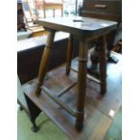 An early 20th century ash and beech stool