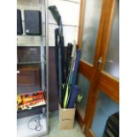 A quantity of fishing rods and stands etc.