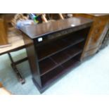 A modern dark oak open bookcase