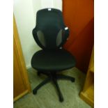 A black swivel office chair
