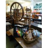 A pine and other spinning wheel with accessories