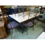 A modern marble effect dinning table with metal base together with a set of four standard,