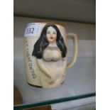 A novelty mug 'Let them swing'