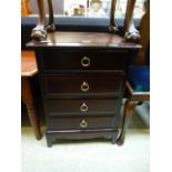 A Stag minstrel bedside chest of four drawers CONDITION REPORT: Generally good