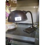 An early 20th century angle poise style desk lamp