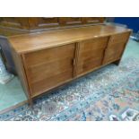 A mid-20th century design teak three door sideboard CONDITION REPORT: Minor marks