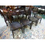 A set of four 1930's dark Ercol chairs