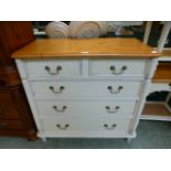 A modern pine and cream painted chest of two short over three long drawers CONDITION
