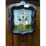 An early 20th century wall clock,