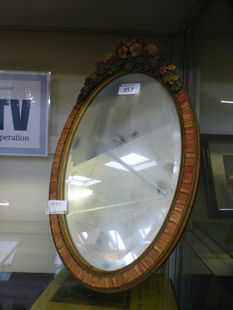 An early 20th century floral decorated easel mirror