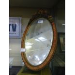 An early 20th century floral decorated easel mirror