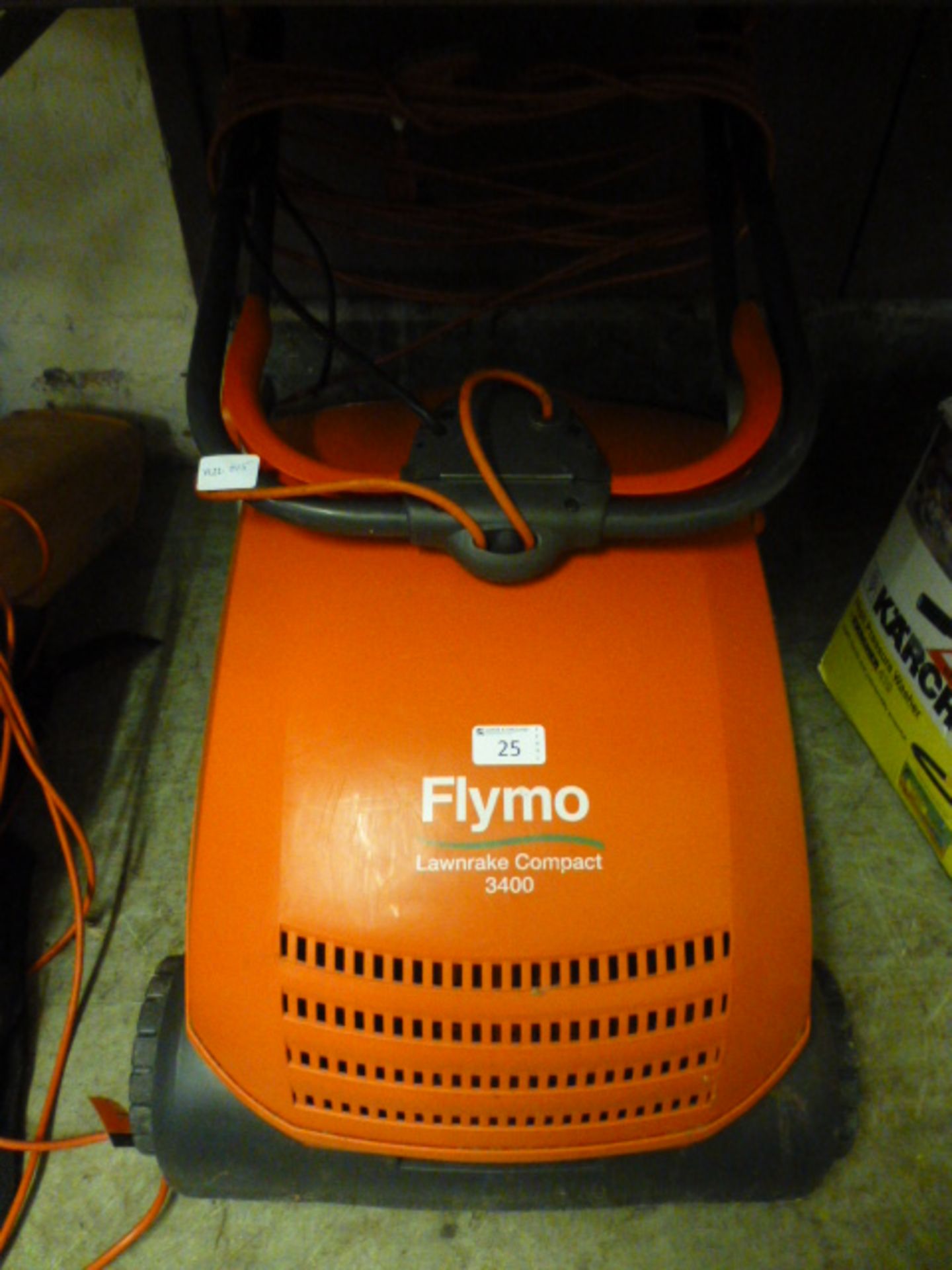 A Flymo lawnrake compact 3400