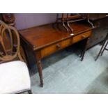 A Victorian mahogany two drawer side table on turned legs CONDITION REPORT: Marks