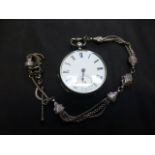 A silver cased pocket watch with chain