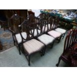 A set of six standard and two carver early 20th century reproduction mahogany dinning chairs