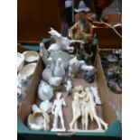 A tray of assorted figurines to include horses, birds, people etc.