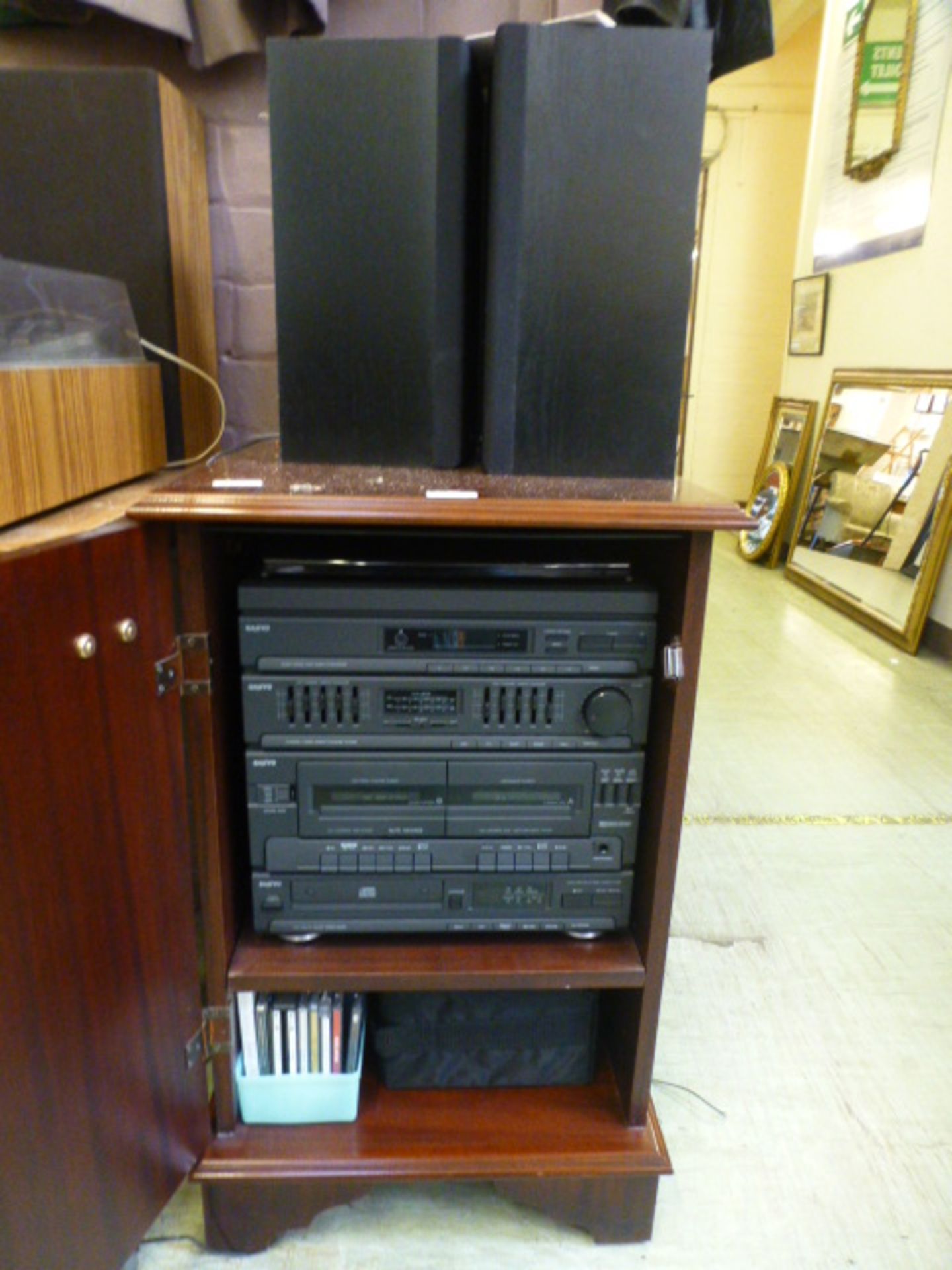 A Sanyo hif-fi system in cabinet