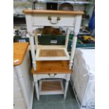 A pair of pine topped and cream painted bedside cabinets having single drawer above open storage