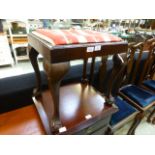 An 18th century style walnut stool on cabriole legs with ball and claw feet