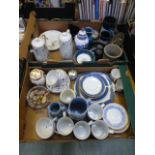 Two trays of decorative ceramic ware to include mugs, coffee pots etc.
