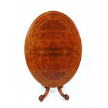 An Edwardian burr walnut, amboyna and tulipwood banded,