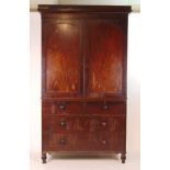 A 19th century mahogany linen press,